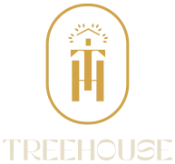 The image shows a gold emblem featuring a stylized treehouse design and the word "TREEHOUSE" written below it in a matching gold font.