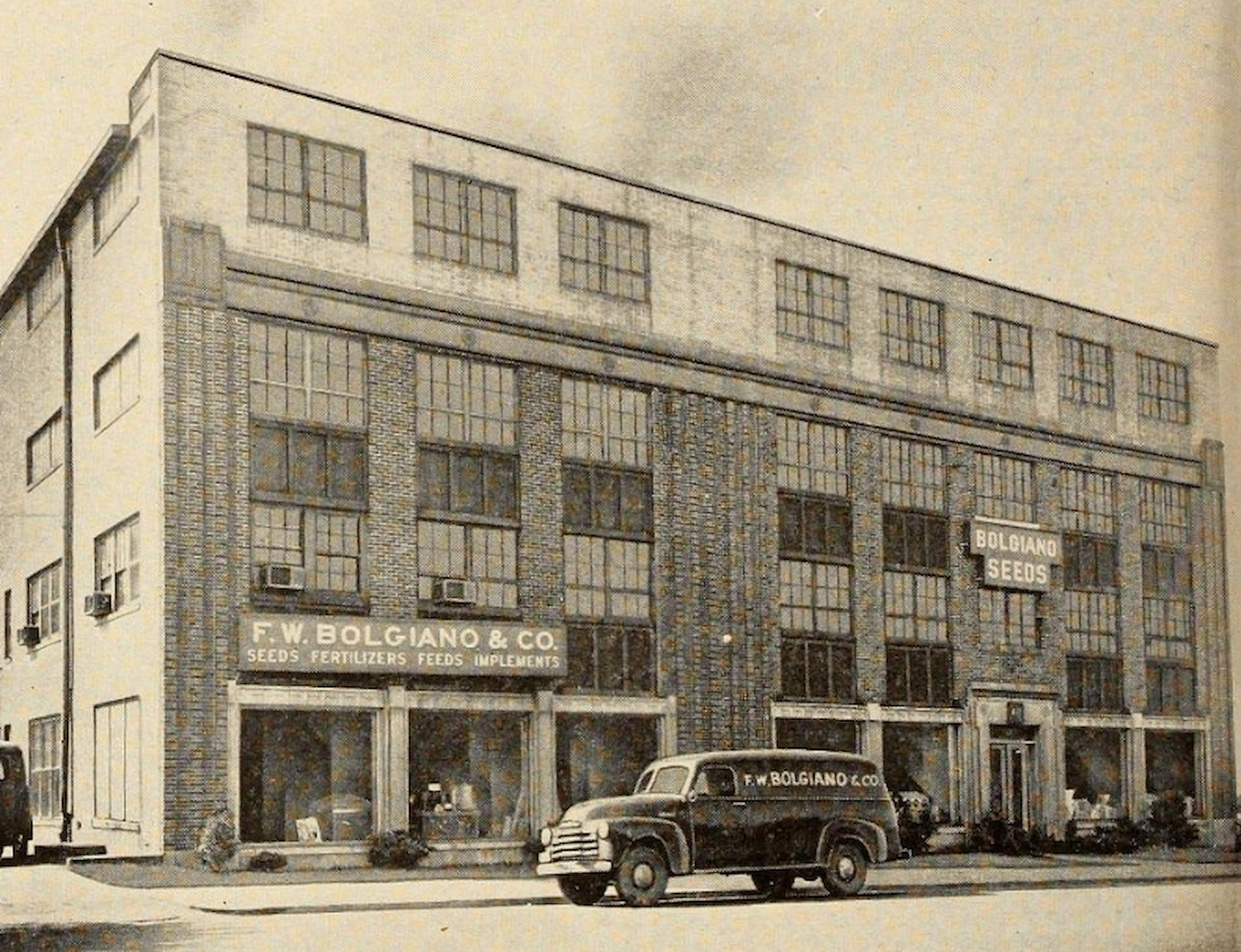 The image shows a multi-story building with signs for 